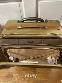 Hartmann beige nylon upright rolling overnight weekender cabin suitcase bag