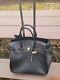 KC Jagger Black Leather Ostrich Print Wheeled Rolling Bag Travel Luggage