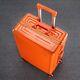 Sleek Waterproof Rolling Bag Hard Shell Spinner Case, Orange, 20 inches